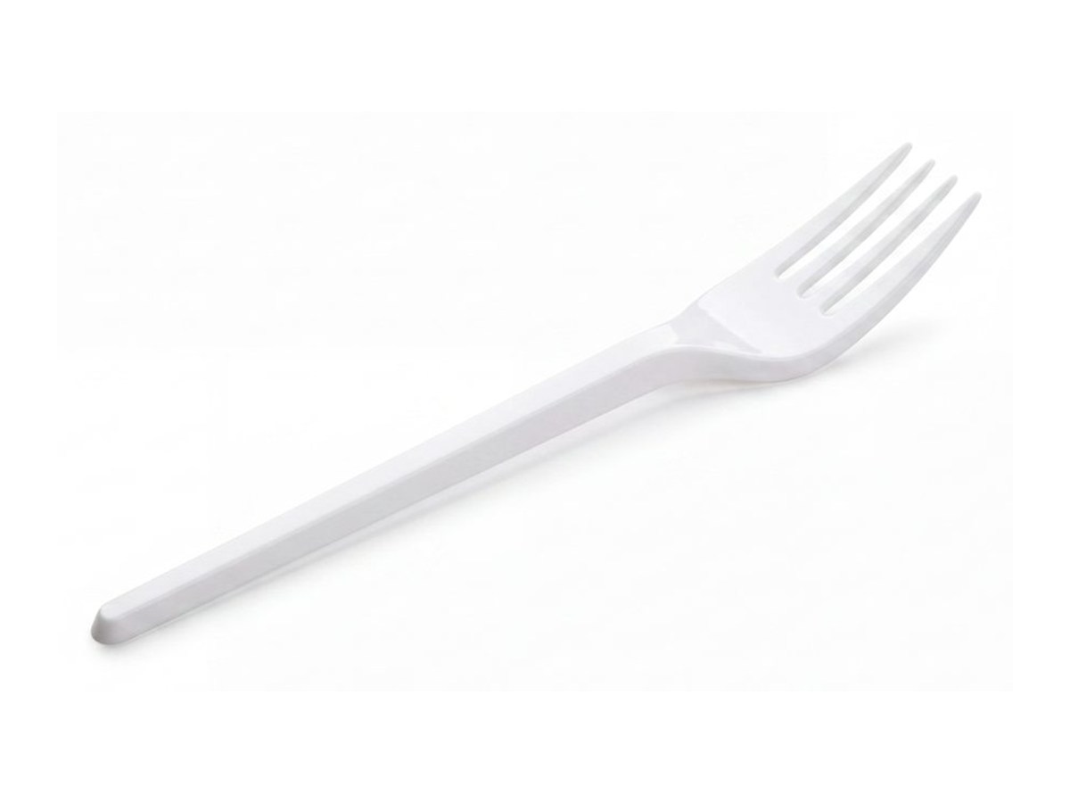 White disposable fork on a white background