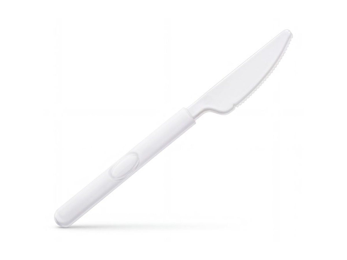 White disposable knife on a white background